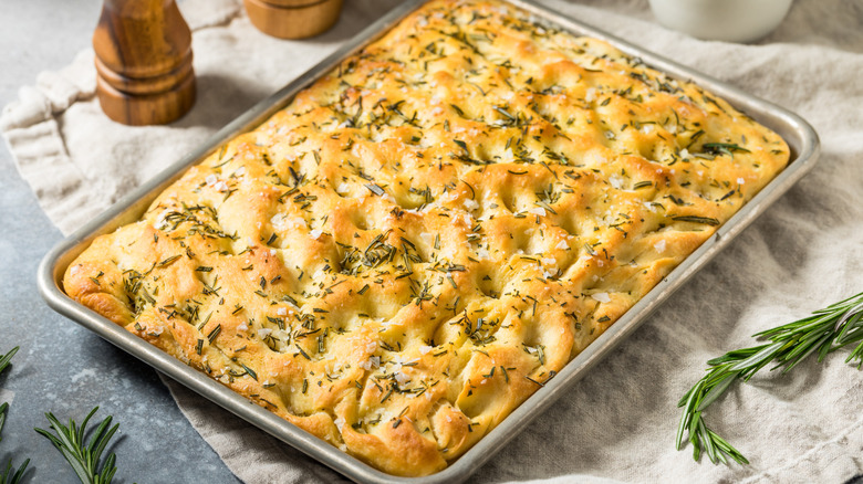 Rosemary focaccia in rectangular baking tin