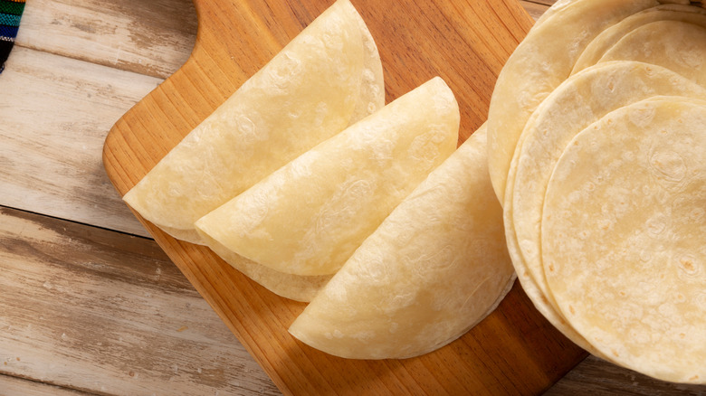 Flour tortillas on wooden board
