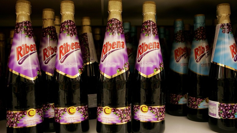 Bottles of Ribena black currant syrup