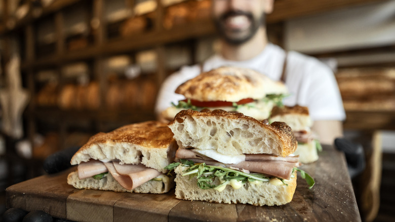waiter at a sandwich shop