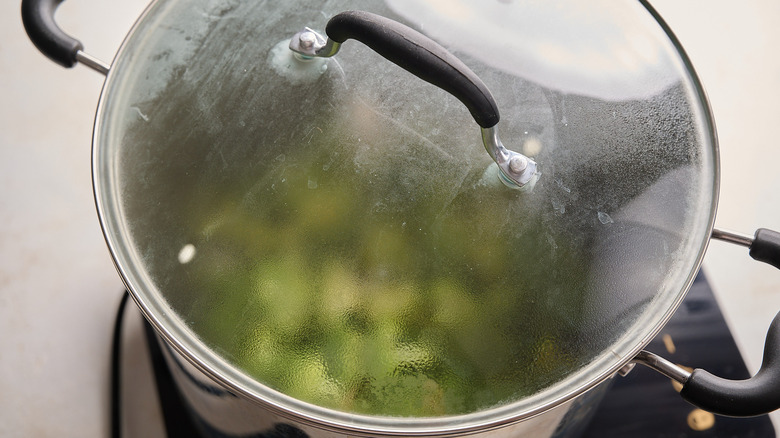 steaming broccoli in a pot
