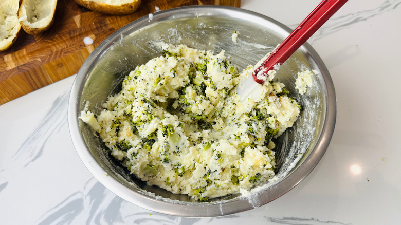 Broccoli cheese mashed potato mixture in bowl
