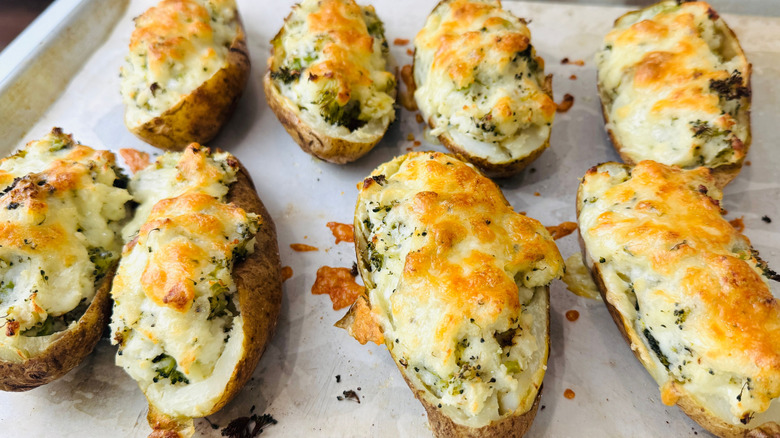Twice baked potatoes on baking sheet