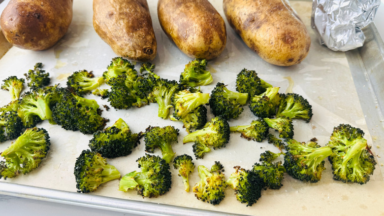 Roasted broccoli and potatoes on baking sheet