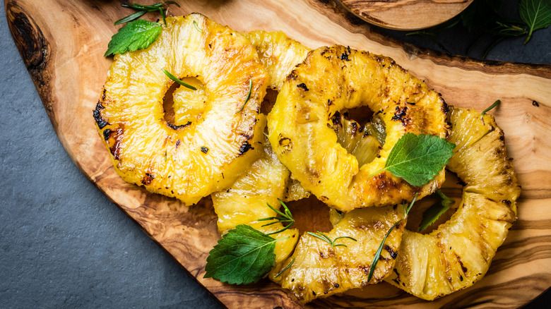 broiled pineapple on cutting board
