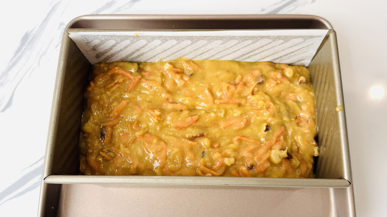 Carrot pound cake batter in loaf pan