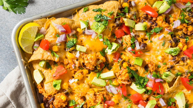 Sheet pan nachos with toppings