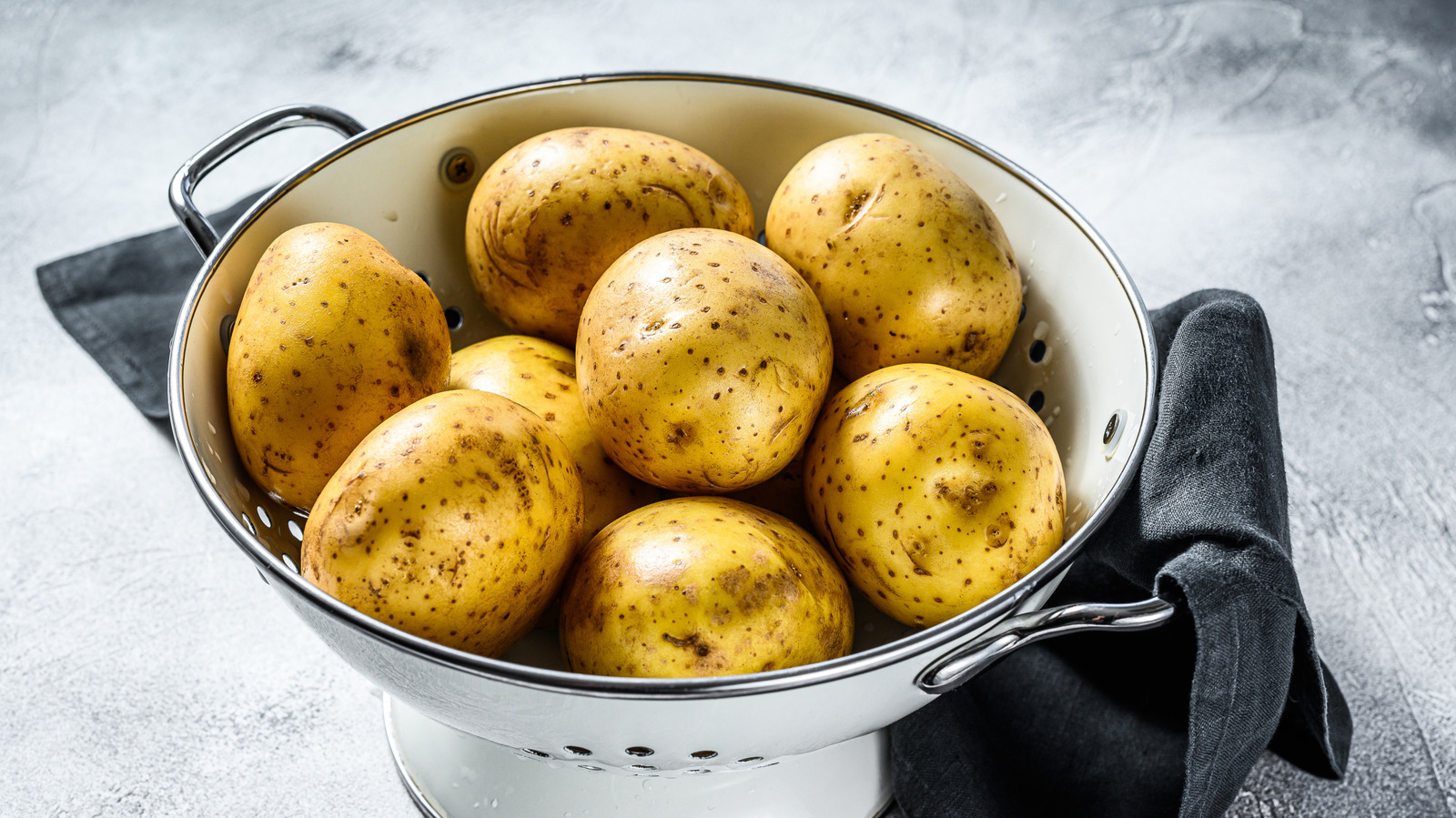 Brown Spots On Baked Potatoes Aren't Necessarily Unsafe - Tasting Table