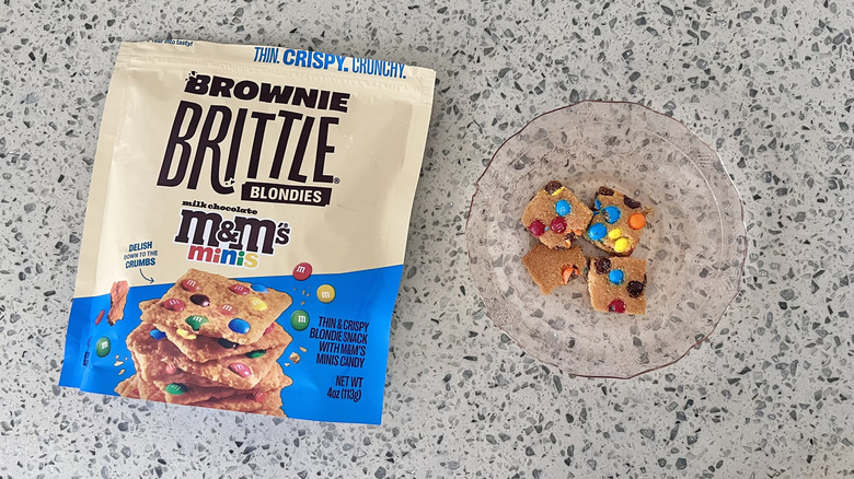 M&M's Blondie Brownie Brittle pieces on a plate