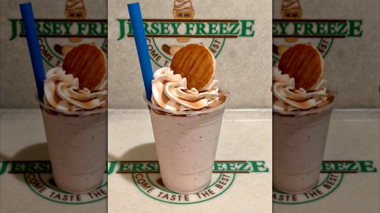 Ice cream shake in front of a Jersey Freeze sign on the wall