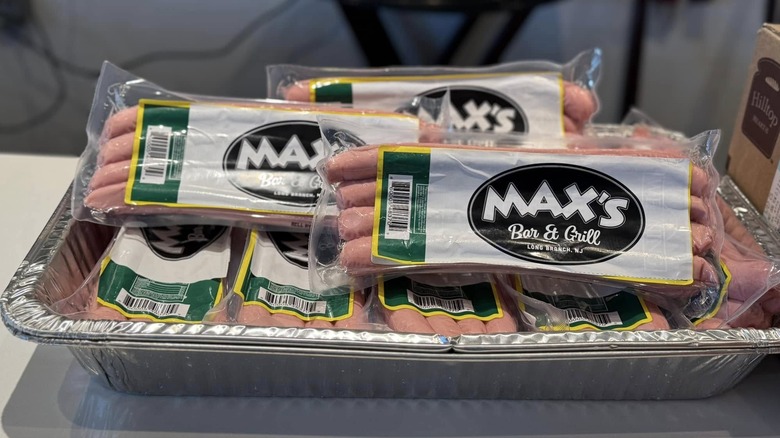 Packages of Max's Bar & Grill hot dogs in a silver tray