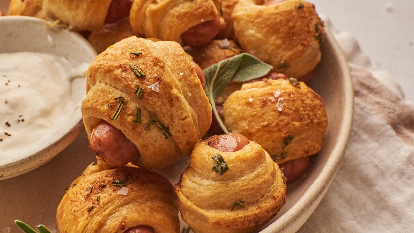 Brush Pigs In A Blanket With Garlic Butter For A More Savory Profile