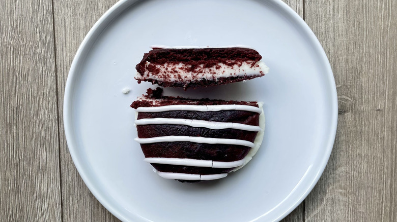 Red velvet whoopie pie sliced on a plate