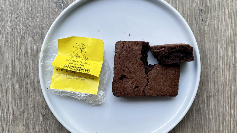 Double Fudge brownie on a plate with packaging