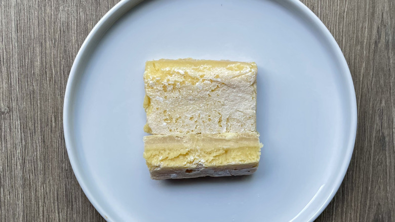Sliced lemon bar on a plate