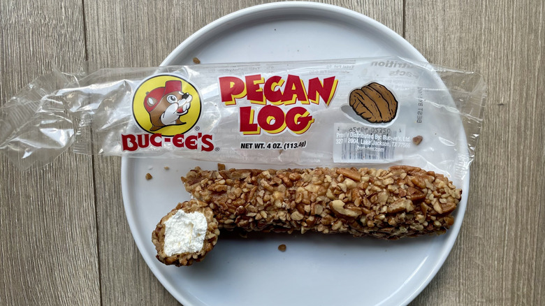 Unwrapped pecan log on a plate