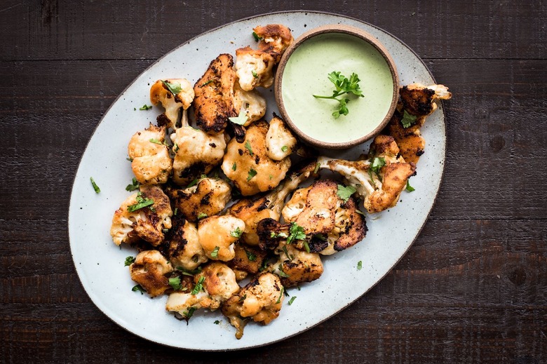 Buffalo Cauliflower Bites with Herbed Tahini Dip