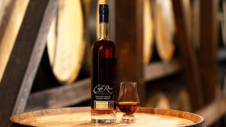 Buffalo Trace Antique Collection 2025 Eagle Rare 17-year-old bottle and glass in distillery