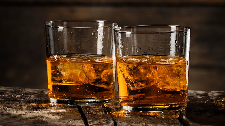Whiskey in glasses on bar