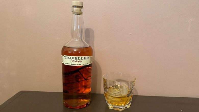 Traveller Whiskey with a glass poured on the rocks