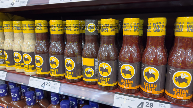Buffalo Wild Wings sauces at a grocery store on a shelf