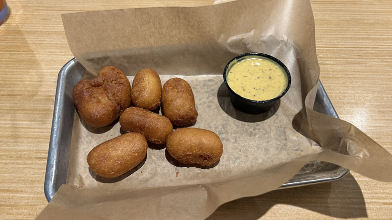 Buffalo Wild Wings mini corn dogs with honey mustard.