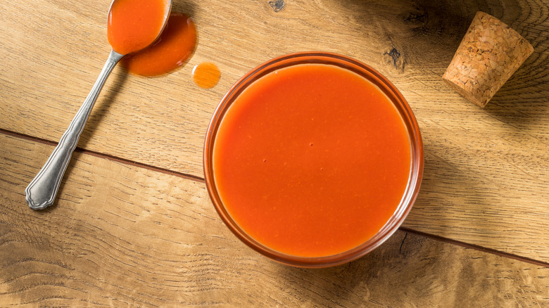 Top-view of a dish of Buffalo sauce