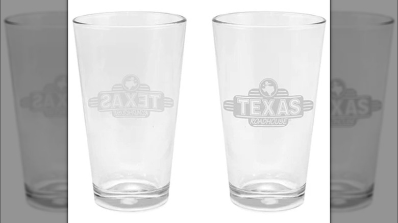 Two pint glasses with Texas Roadhouse branding