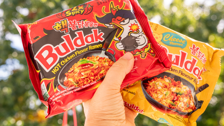 Two packs of Buldak chicken ramen, close up