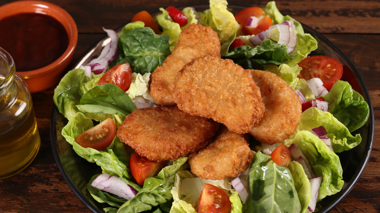 chicken nuggets with salad