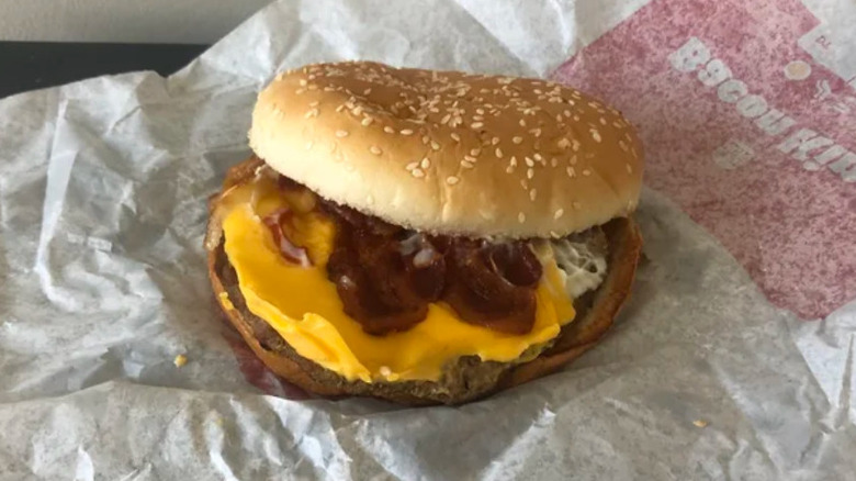 A Burger King Bacon King unwrapped from its packaging