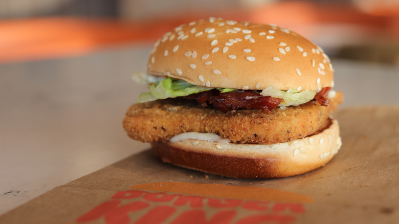 Close-up of a Burger King chicken burger with bacon