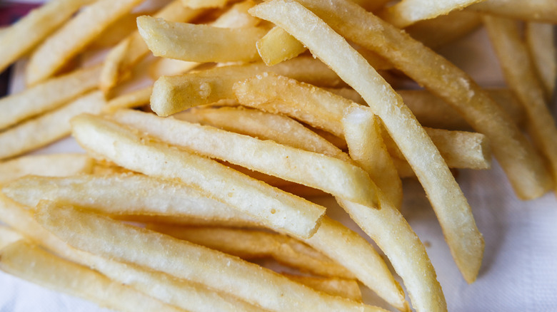 Close up of Burger King French Fries lying on a wrapper