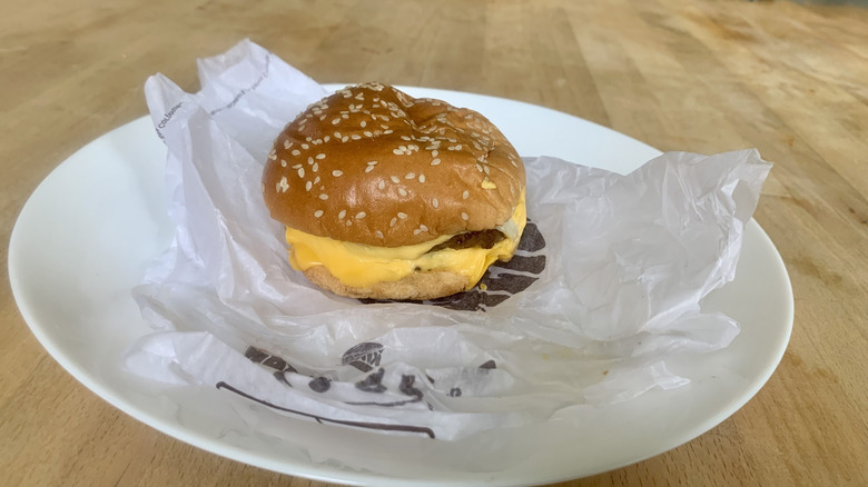 a Burger King double cheeseburger on a white plate