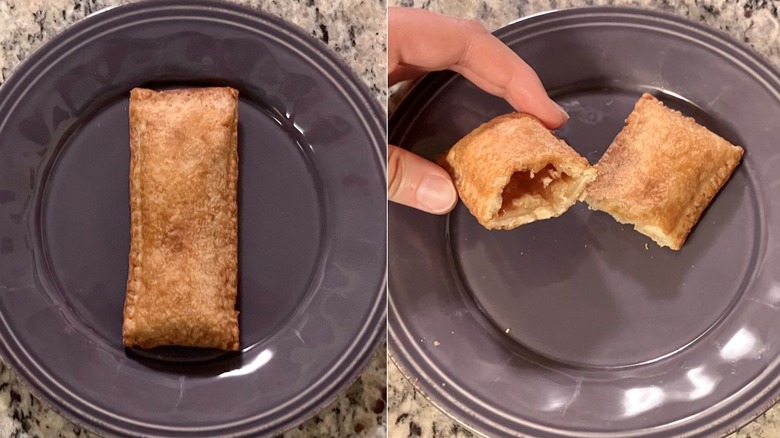 A whole Burger King cinnamon apple pie sits on a purple plate on the left and a Burger King cinnamon apple pie cut in half sits on a purple plate on the right with half of the pie lifted up