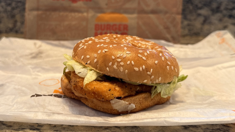 Chicken Jr. sandwich on opened wrapper on counter