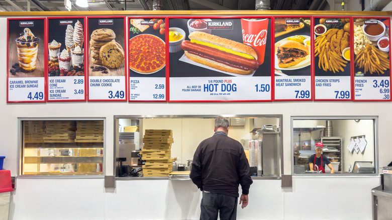 person waiting at food court at Costco