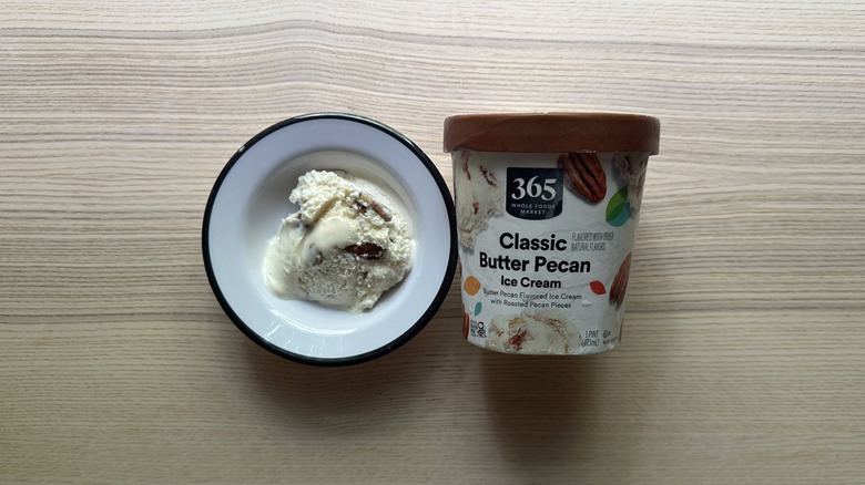 365 Classic Butter Pecan Ice Cream on wooden table
