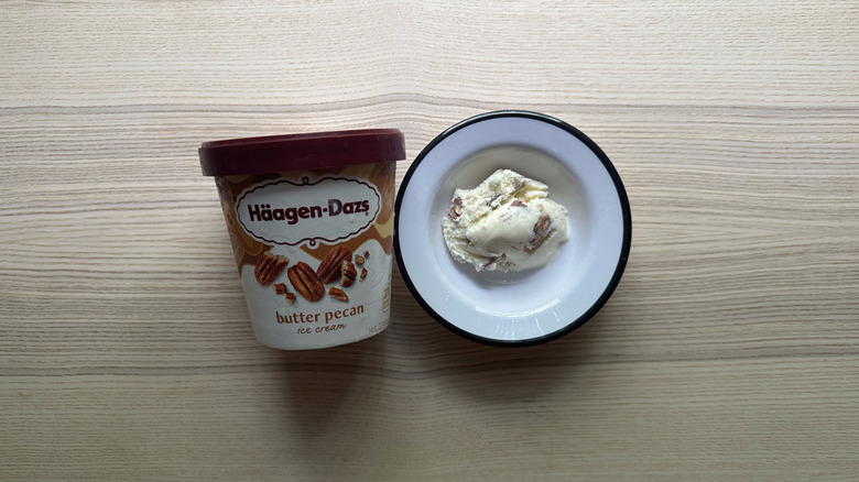 Häagen-Dazs Butter Pecan Ice Cream on wooden table