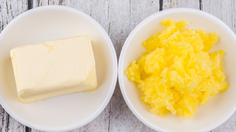 butter versus ghee side by side in white bowls