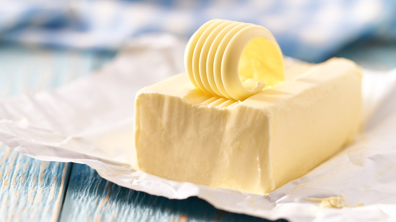 A block of butter on a table