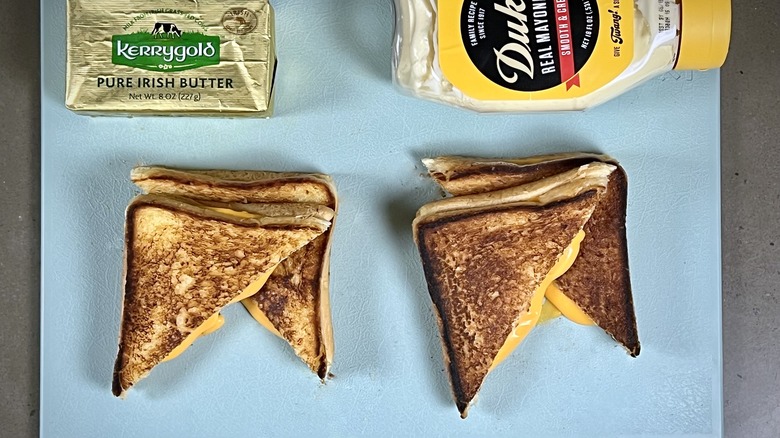 Halved grilled cheese butter mayo