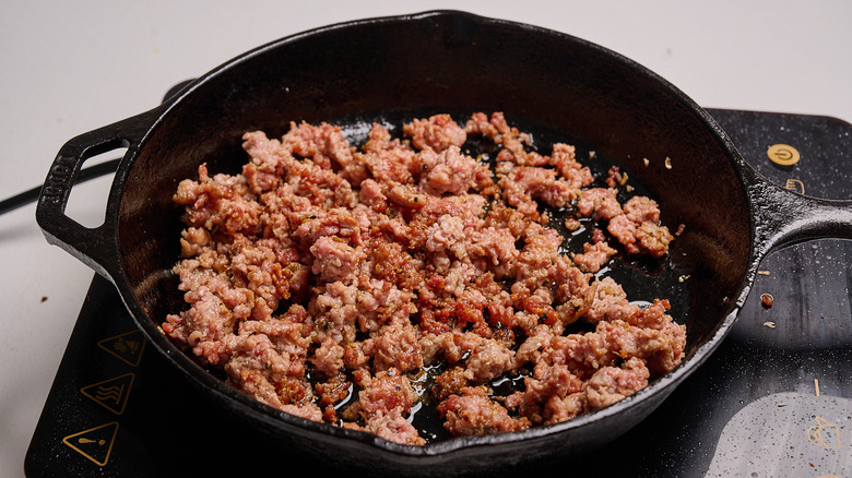 browned sausage in a skillet
