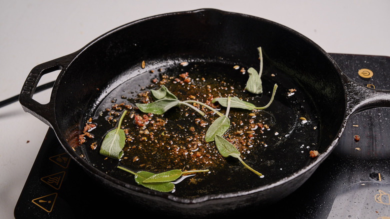 crisping sage in a skillet
