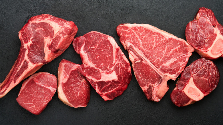variety of raw steak cuts
