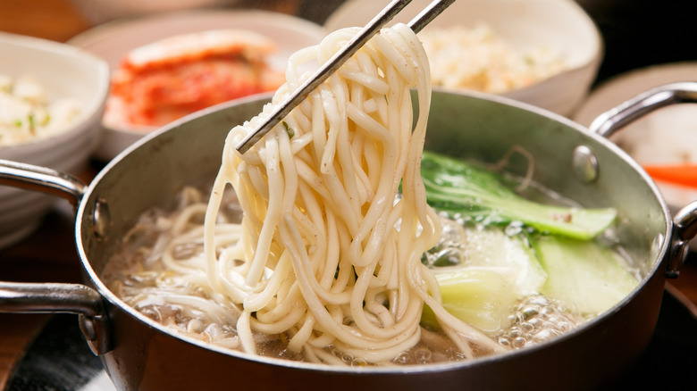 instant noodles with cabbage in pot