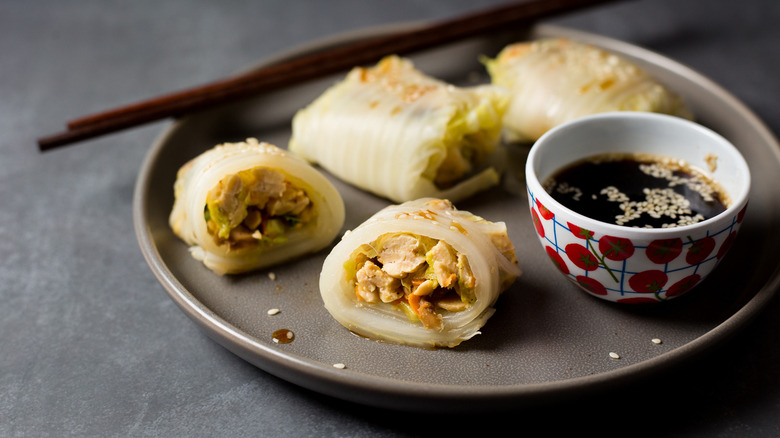 cabbage rolls on gray plate
