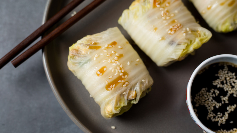 cabbage rolls on gray plate