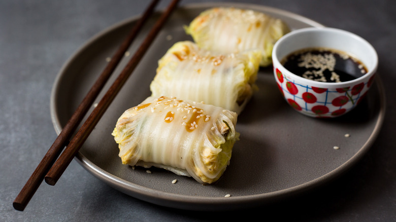 cabbage rolls on gray plate