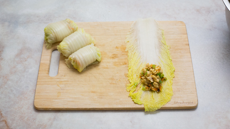cabbage rolls on wooden board